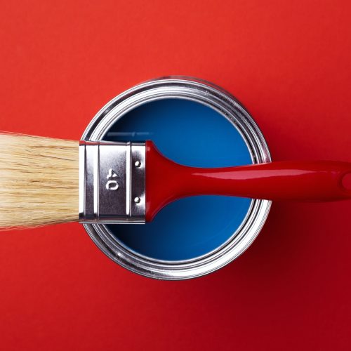 Can with Blue Paint with Red Brush.